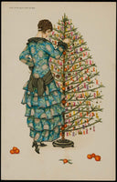 Mela Koehler, Woman in blue dress decorating a Christmas tree